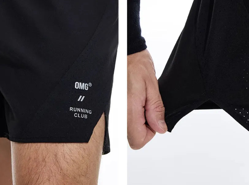 Men's black four-point running shorts with laser stitching on a flat surface, showing stretch fabric.