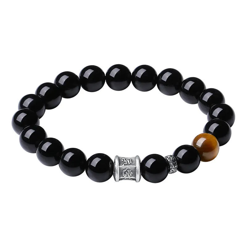 Men's obsidian bracelet with prayer wheel centrepiece and 10mm beads