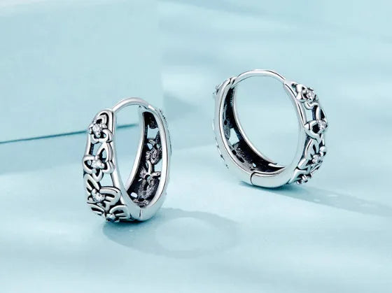 Sterling silver retro hollow butterfly zircon earrings measuring 14mm x 5mm with 925 silver guarantee