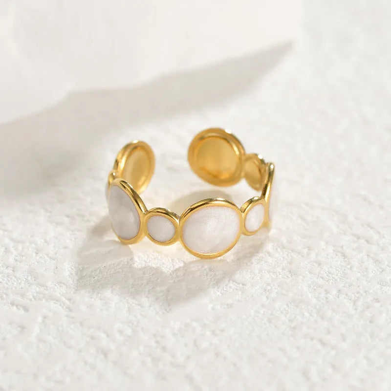 Stainless steel geometric ring with adjustable opening and electroplated finish