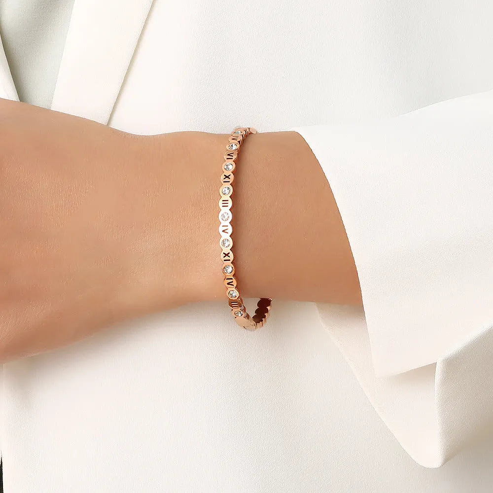 Korean style titanium steel bracelet with number charms in steel, gold or rose gold colour