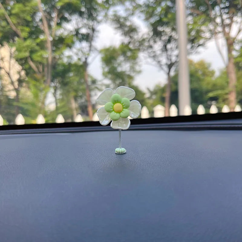 Plastic car decoration ornament with swing design in blue colour showing 5cm height measurement