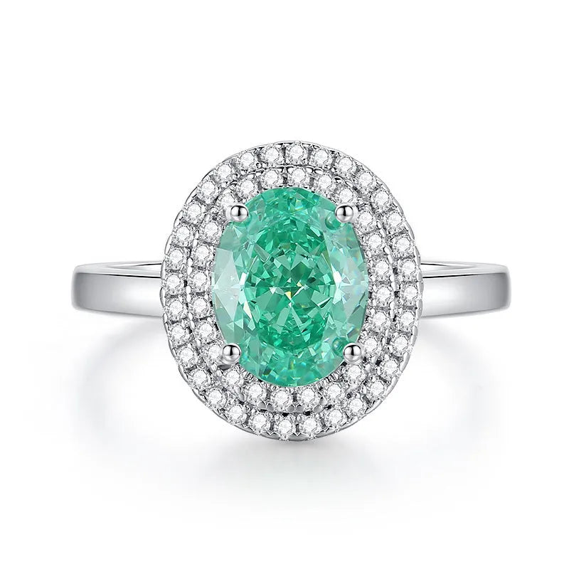 Geometric S925 silver ring with an oval Palaibahao stone and diamond inlay on a model's finger.