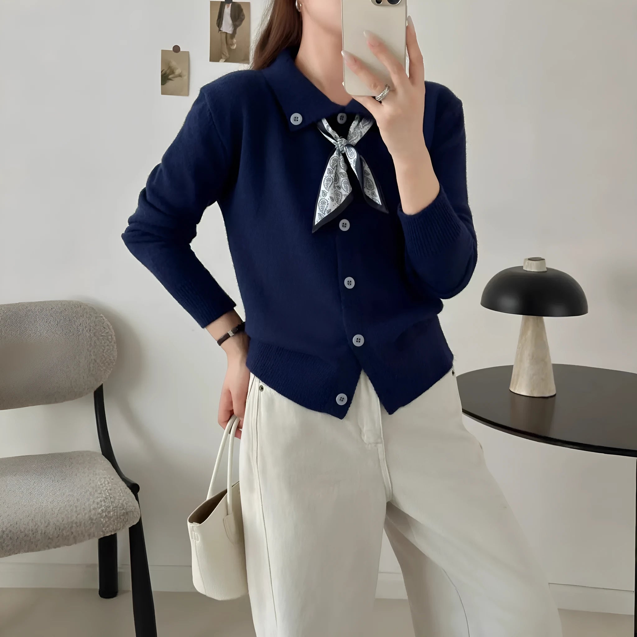 Women's grey lapel scarf cardigan sweater with colour-block panels and long sleeves.