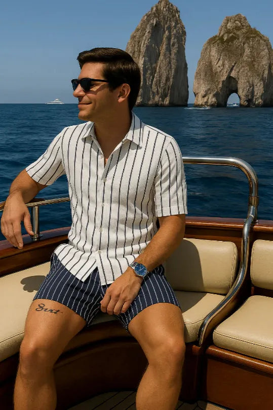 Men's beach shirt and shorts set in four-sided elastic fabric showing light mature casual style