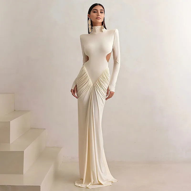 Women's slim fit backless dress with high collar, long sleeves and pleated detail in polyester fabric