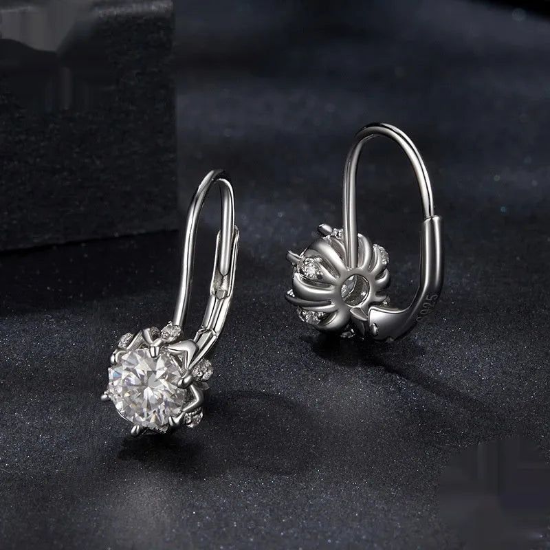 Sterling silver flower bud ear clip earring with white gold plating and moissanite stones