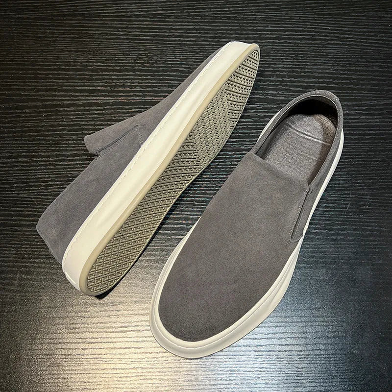 Men's slip-on casual shoes in apricot with round toe, sewing detail, and a mid-height rubber sole.