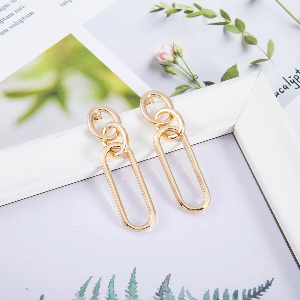 Sterling silver needle coloured geometry hoop earrings with ring and line design elements