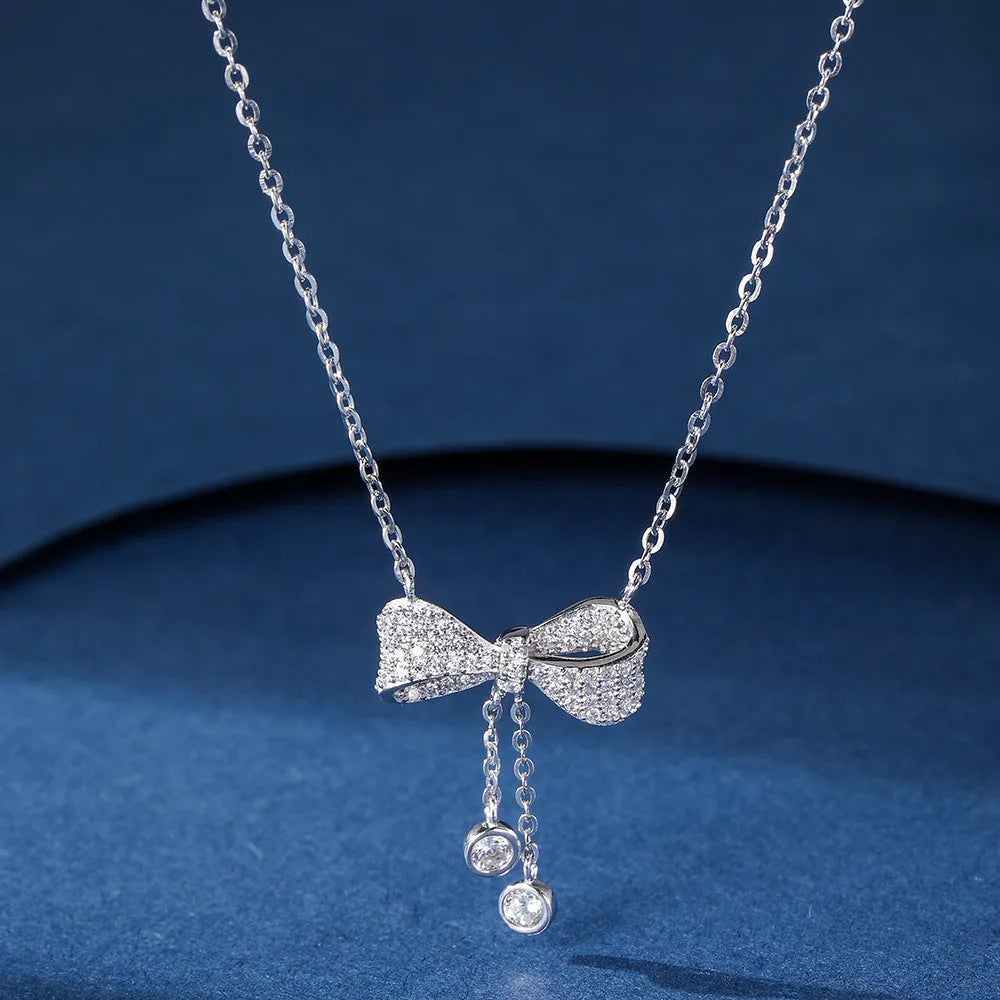 Sterling silver 925 necklace with bow pendant on O-ring chain, 40-45cm length
