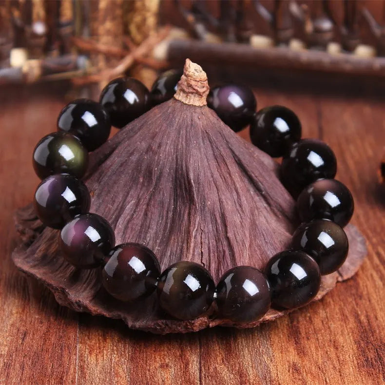 Natural crystal Pi Xiu bracelet with geometric ethnic design in ice stone colours