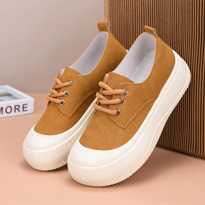 Women's camel suede platform loafers with round toe, flat heel, and front lace-up.