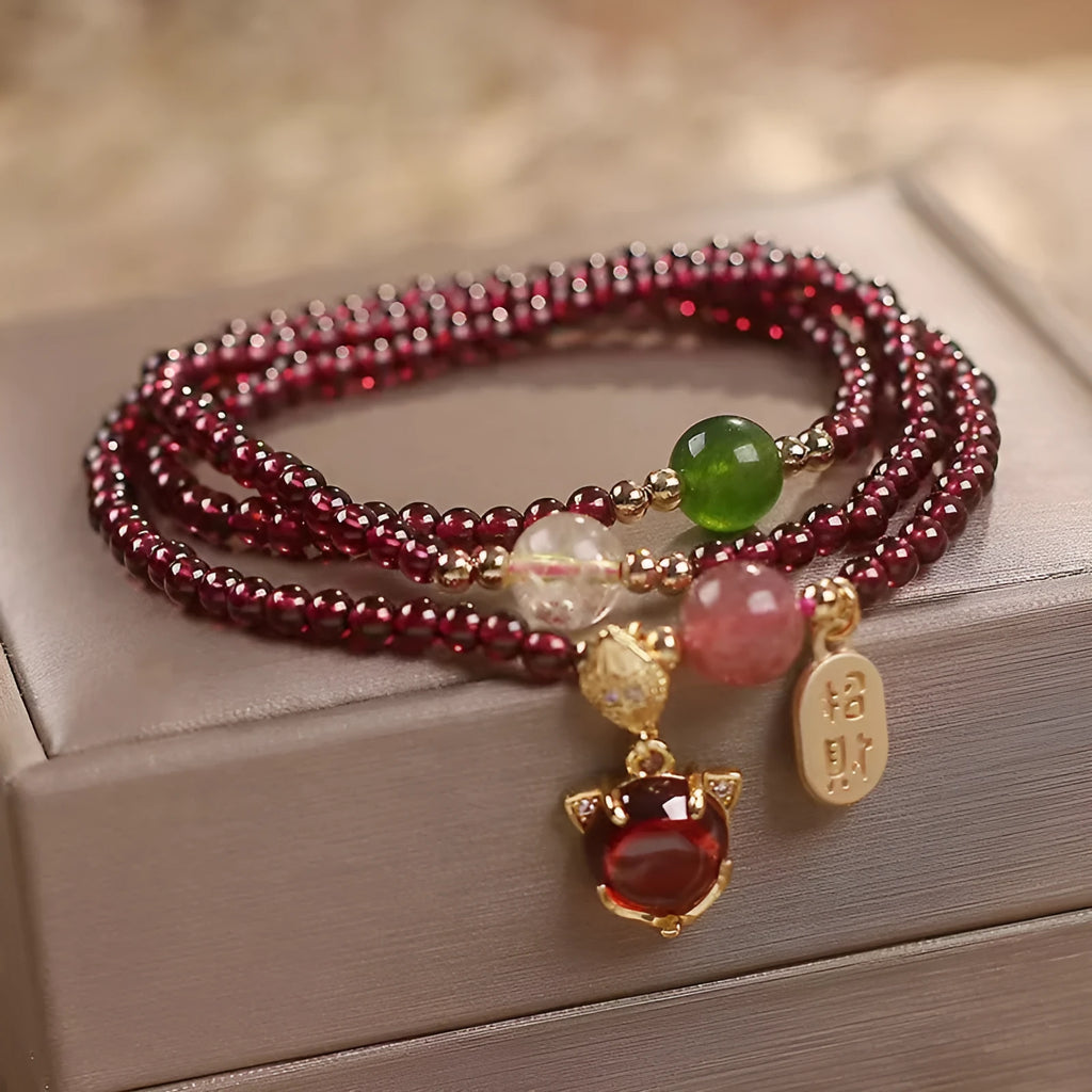 Purplish red garnet fox charm bracelet with adjustable cord fastening for women