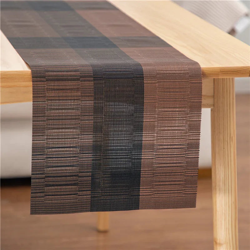 Modern PVC non-slip dish mat in gradient bamboo pattern placed in a kitchen sink.