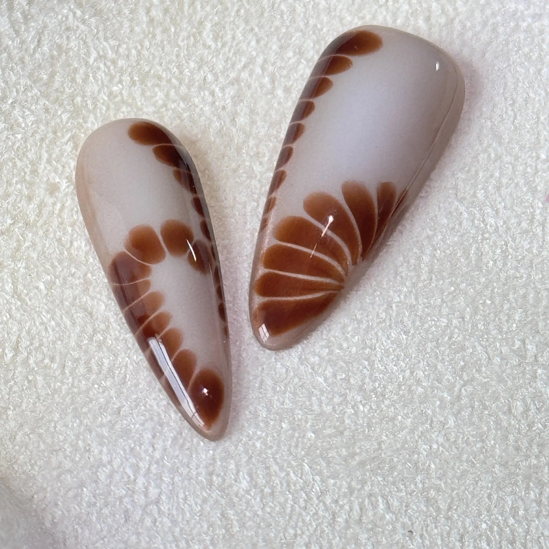 Handmade French style artificial nail stickers with leopard, cross, and flower prints in long-tip wear-resistant design.
