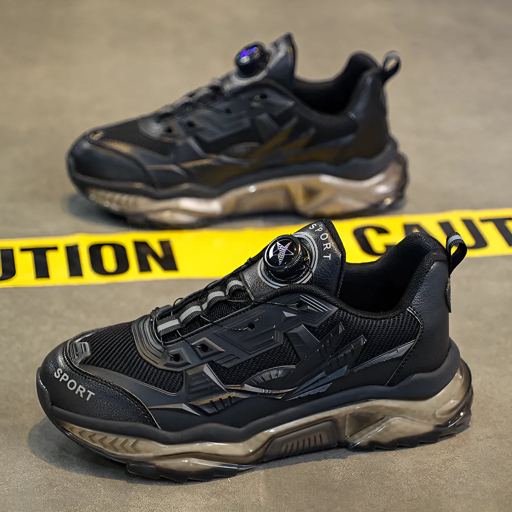 Men's black rotating button casual sneakers with mesh upper and low platform sole.