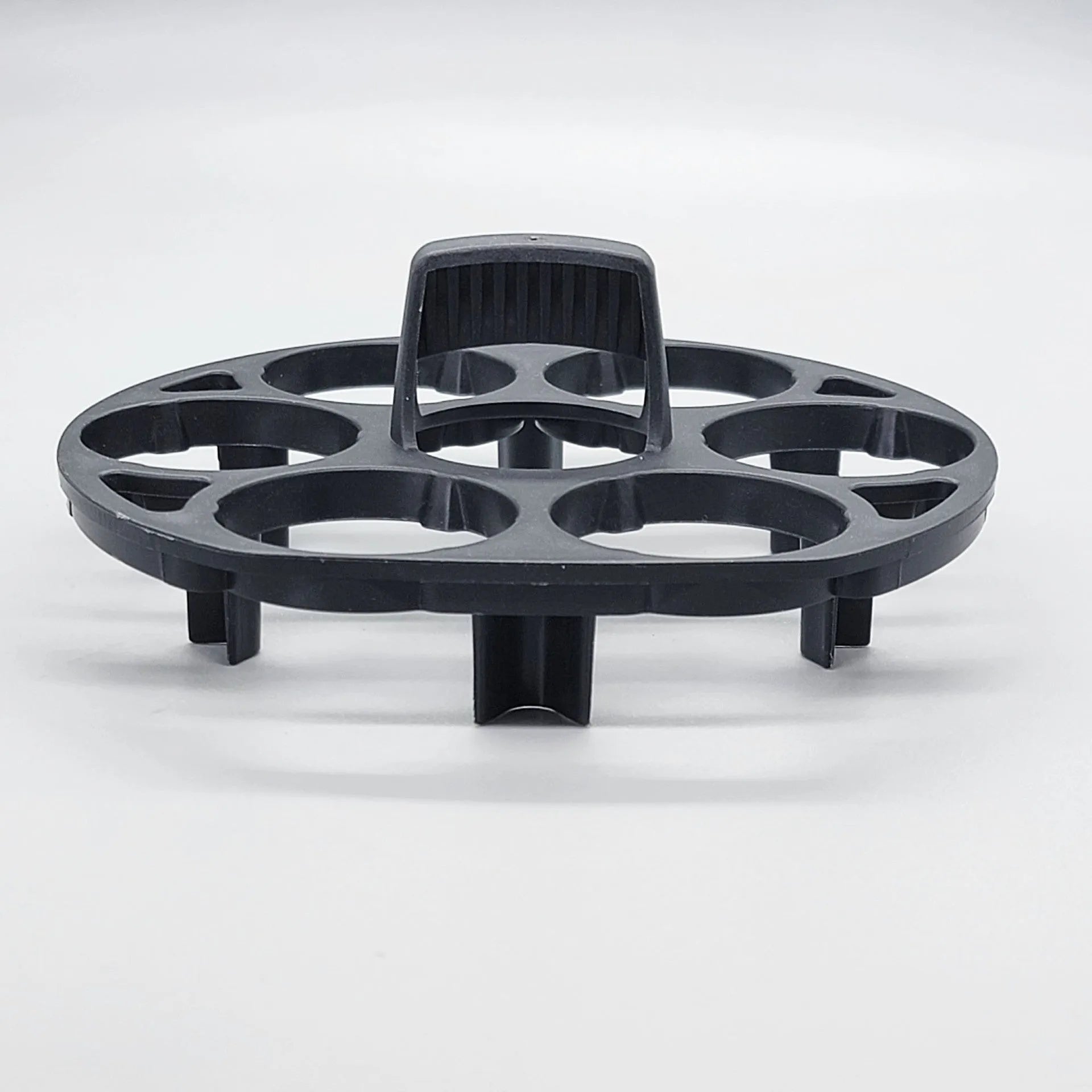 Black plastic egg holder basket with dimensions 13.8 by 12.6 by 5.7 centimetres