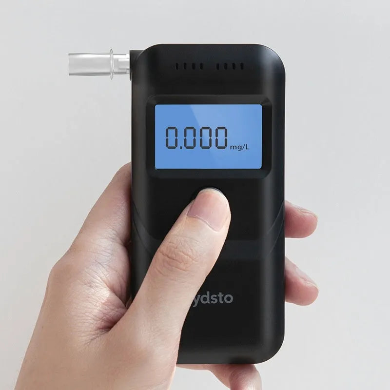 Black portable household alcohol breath tester HD-JJCSY01 on white background