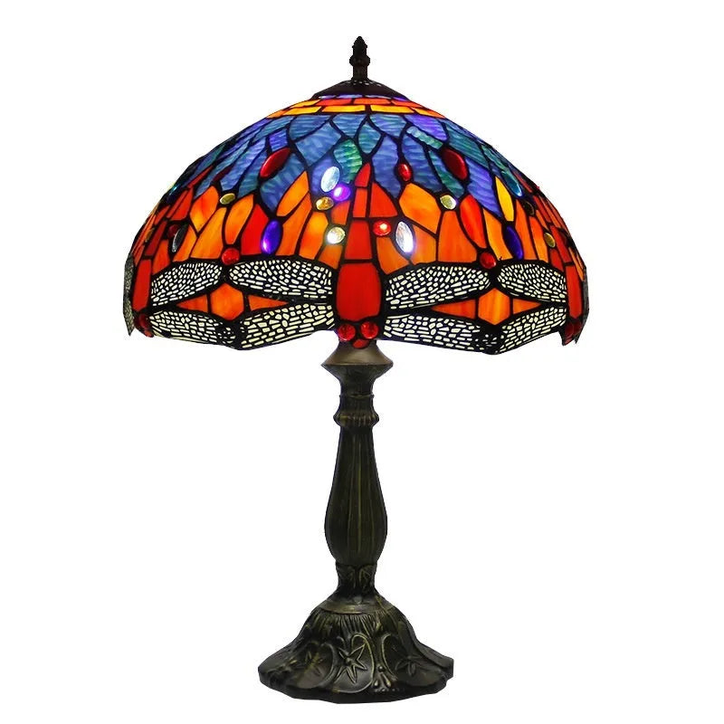 Stone table lamp with Tiffany-style blue dragonfly design on base