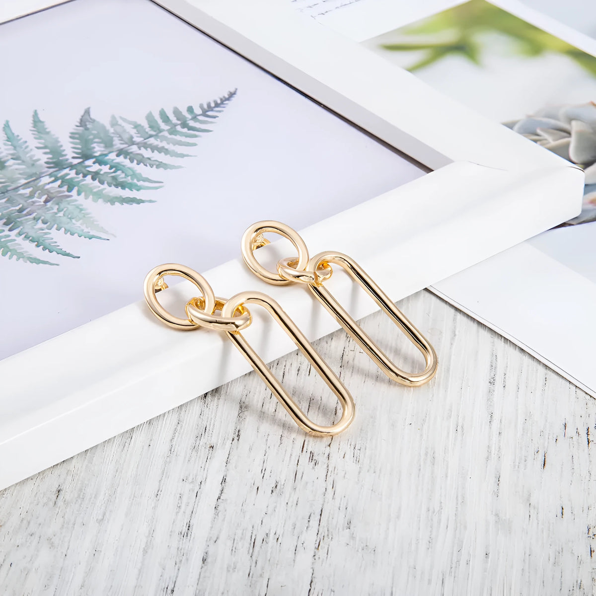 Sterling silver needle coloured geometry hoop earrings with ring and line design elements