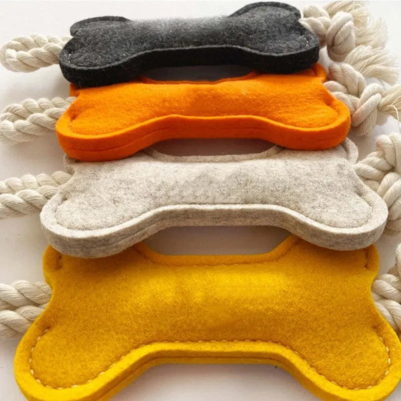 Durable bone-shaped dog chew toy made of felt and rope knots in blue, for bite resistance training.