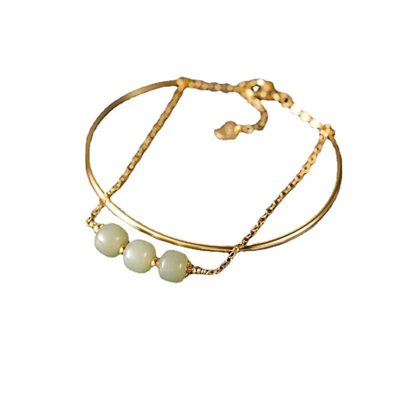 Hetian jade women's bracelet with gold inlay and lucky beads, shown in single, double, and three-bead versions.