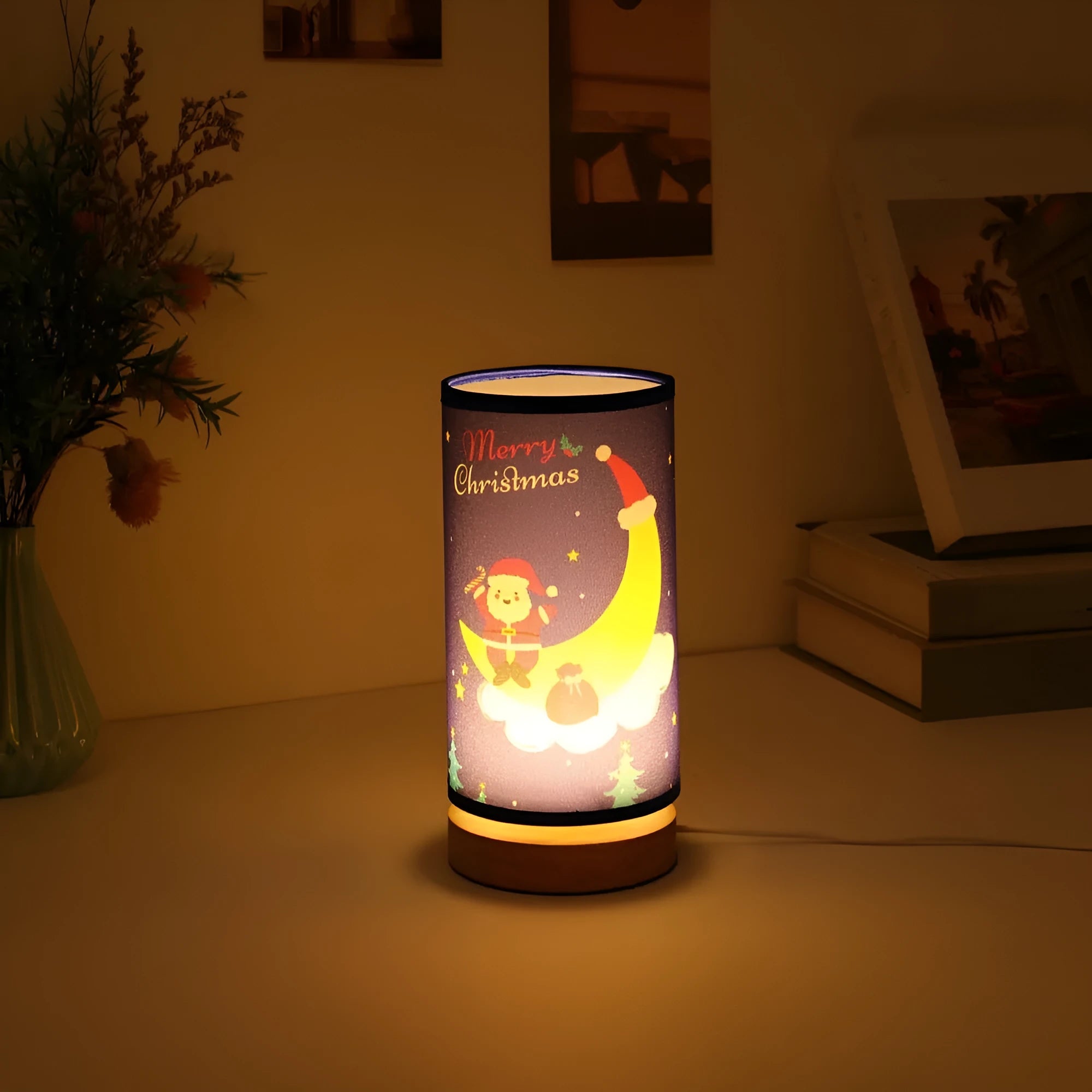 Moon-shaped Santa Claus LED night light with a bamboo base and a white USB plug.