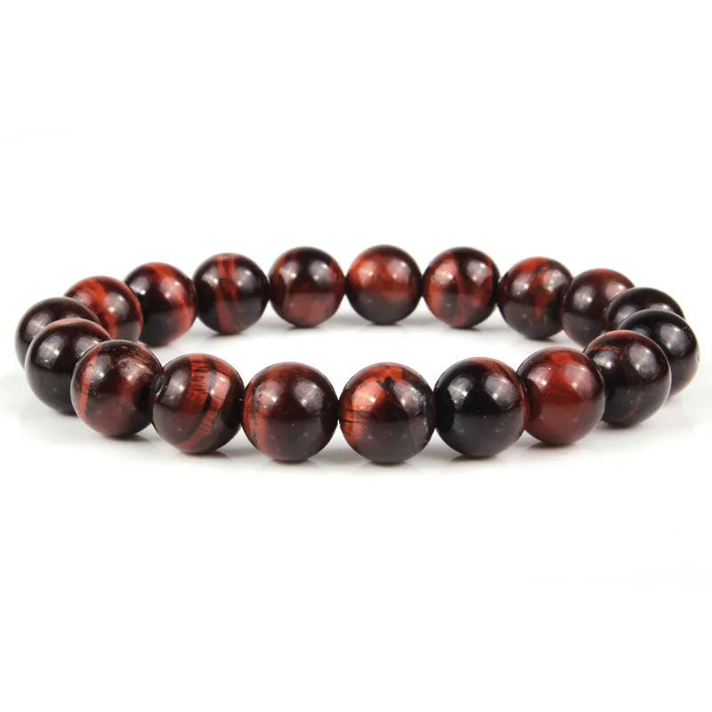 Natural tigereye crystal bracelet with round geometric beads on a wrist