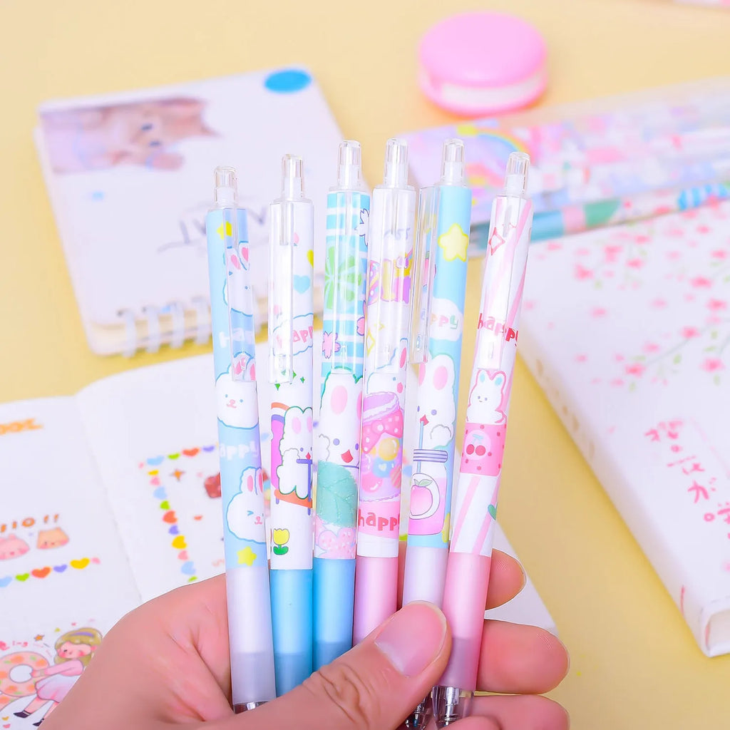 Six black plastic pens with cartoon bunny designs and 0.5mm tips arranged in stationery set