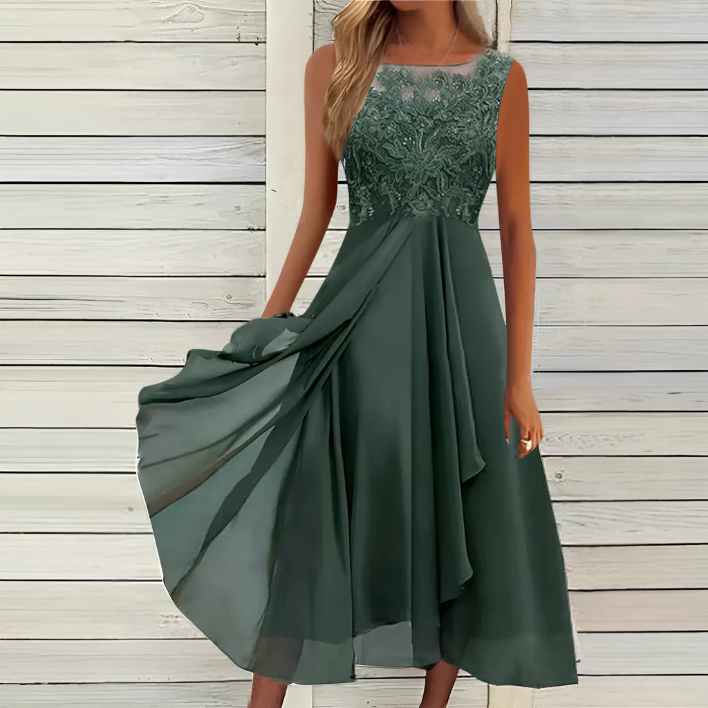 Women's sleeveless chiffon dress with lace hollow-out detail in princess style, shown in green colour