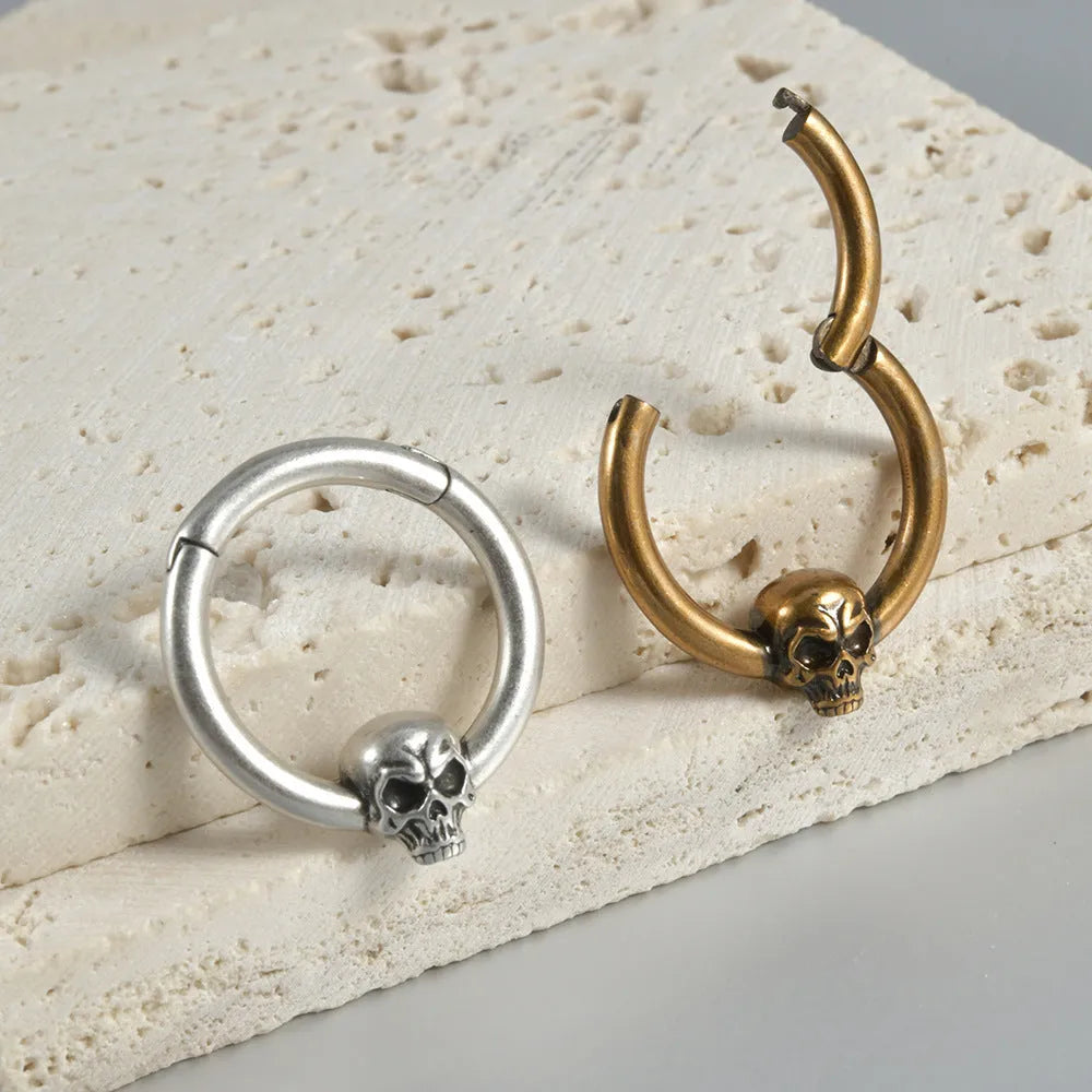 Copper ghost head punk earrings in antique silver and ancient gold finishes