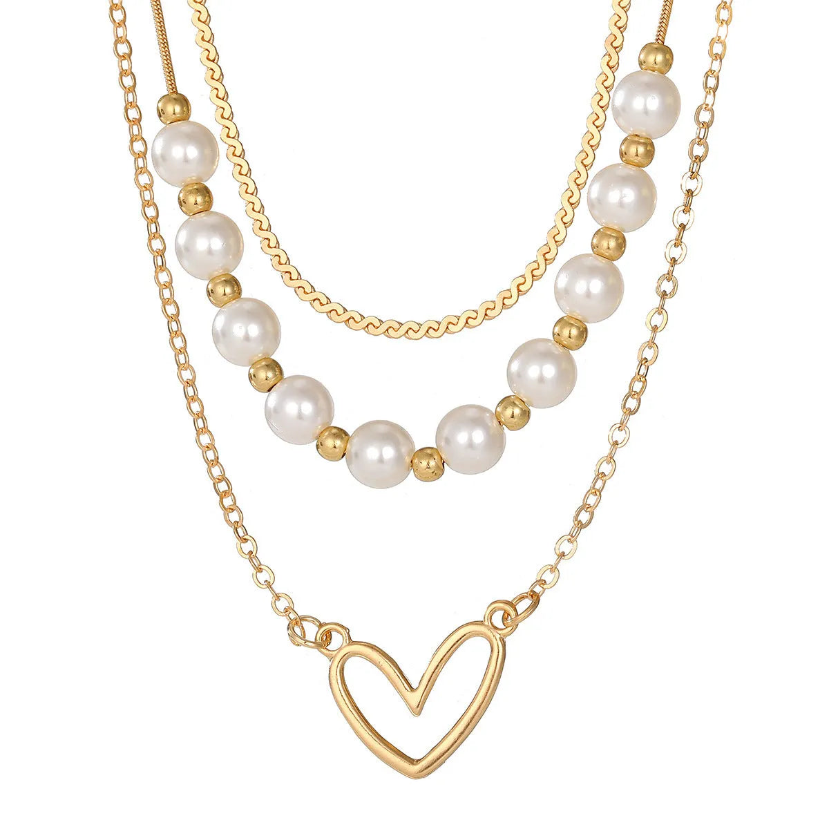 Vintage gold necklace with love heart pendant on a pearl chain, adjustable length.