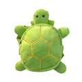 Turtle-shaped dog backpack harness with metal zipper in four colour options on small dog