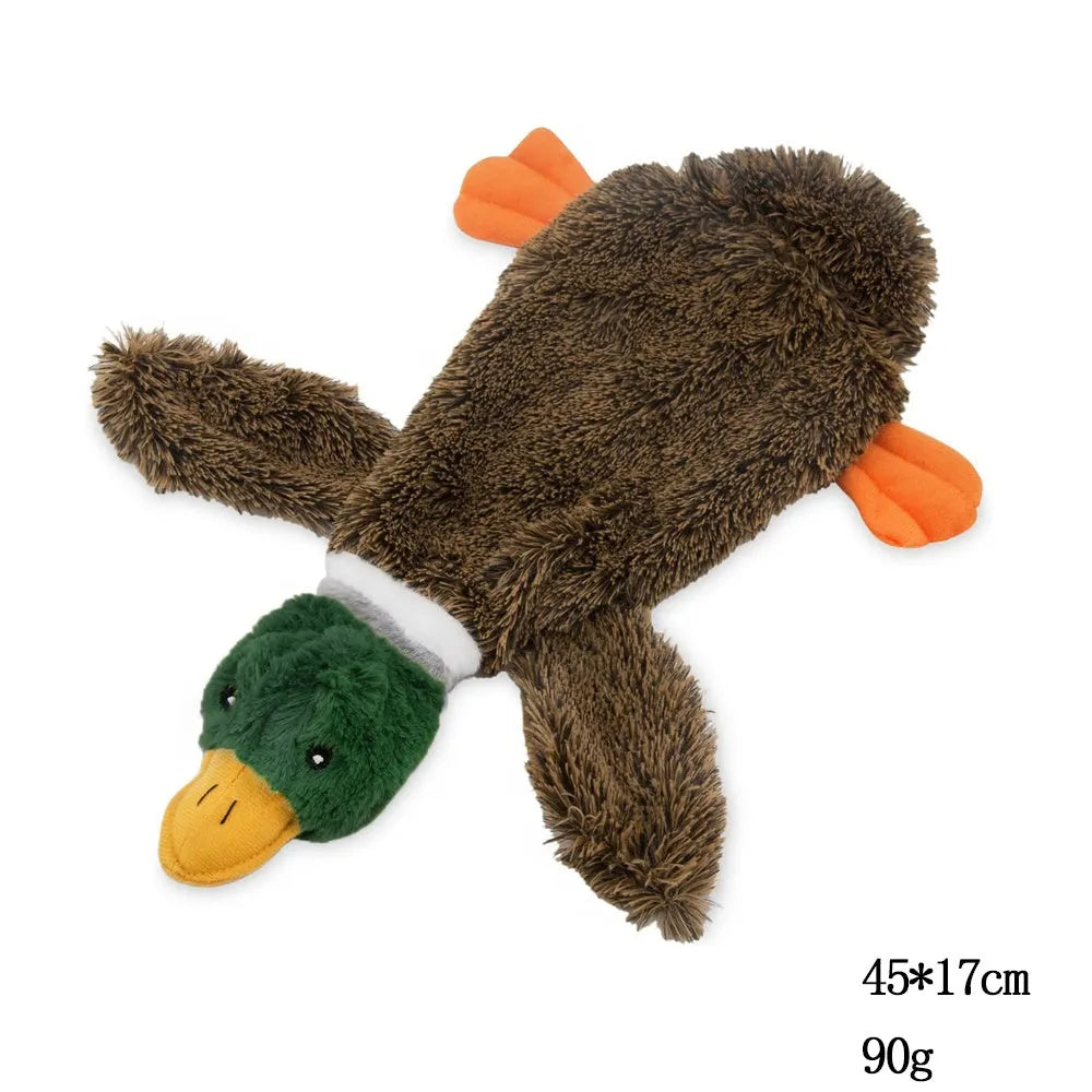 Green stuffless dog toy in wild duck design with squeakers and bottle cavity