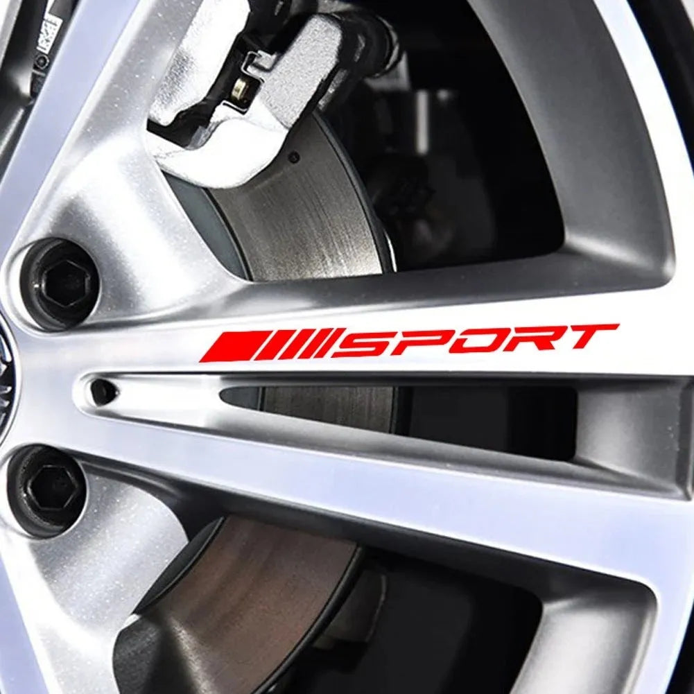 Hollow design black sports car rim sticker on alloy wheel.