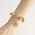 Gold electroplated bracelet with Lucky Fortune gold rutilated quartz crystal and ringing bell in Korean style