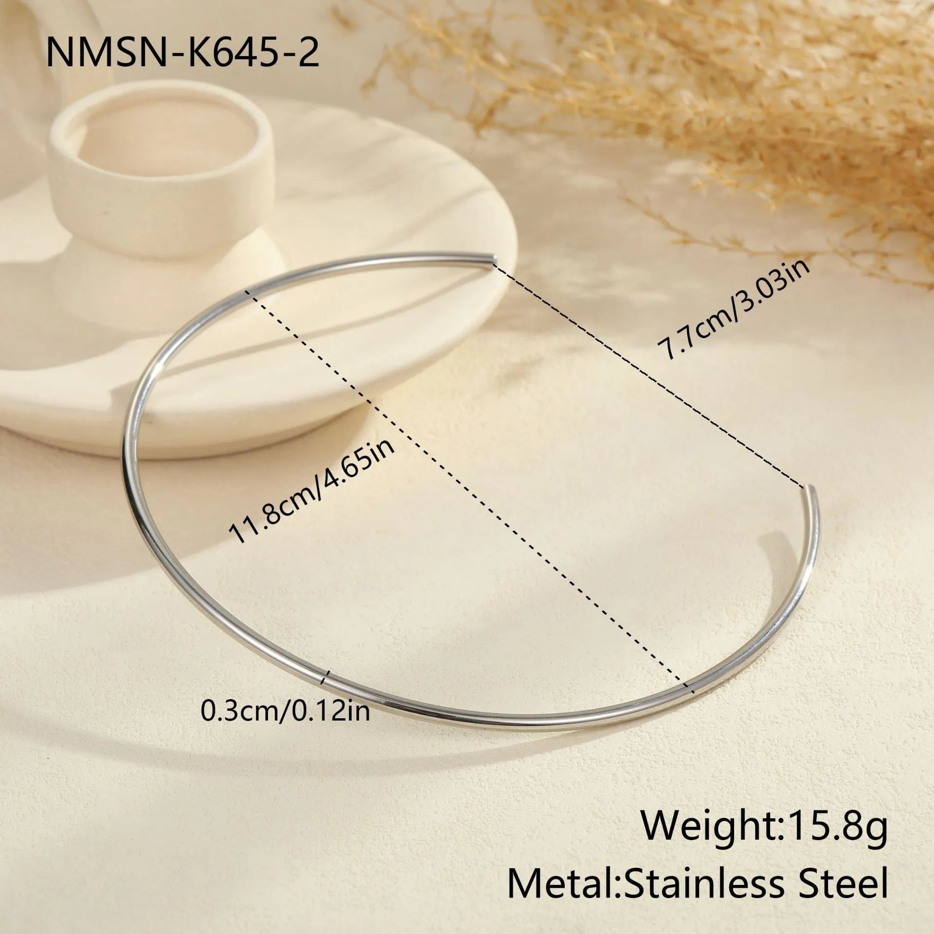 Stainless steel rope necklace with irregular geometric pendants in gold or silver electroplated finish