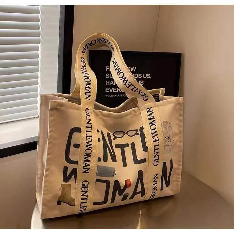 Canvas women's travel tote shoulder bag with printed design in large capacity format