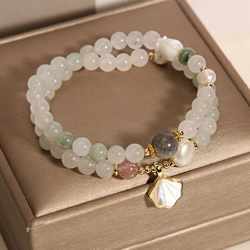Crystal bracelet with Tianshan jade ginkgo leaf pendant, gold-plated inlay, and rhinestone details