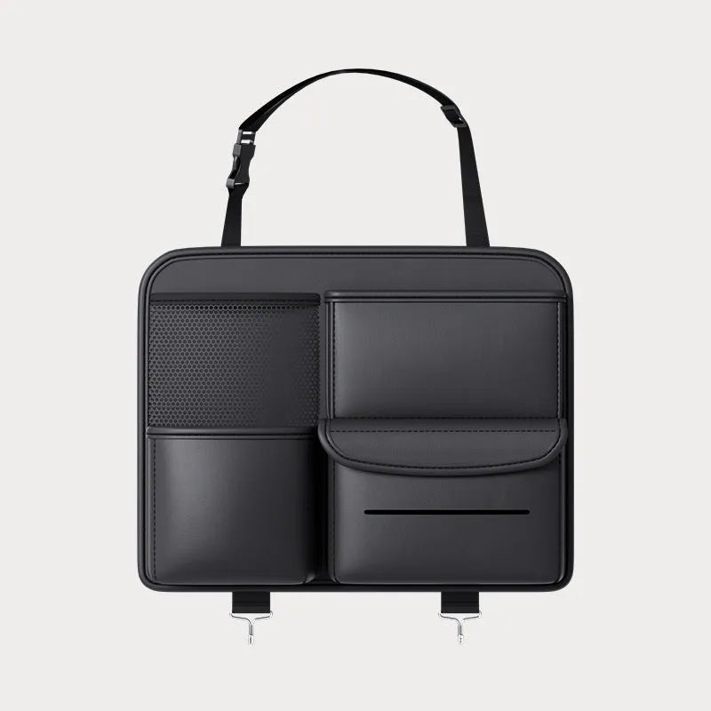 Black leather car seat back storage hanging bag with handle shown on vehicle headrest