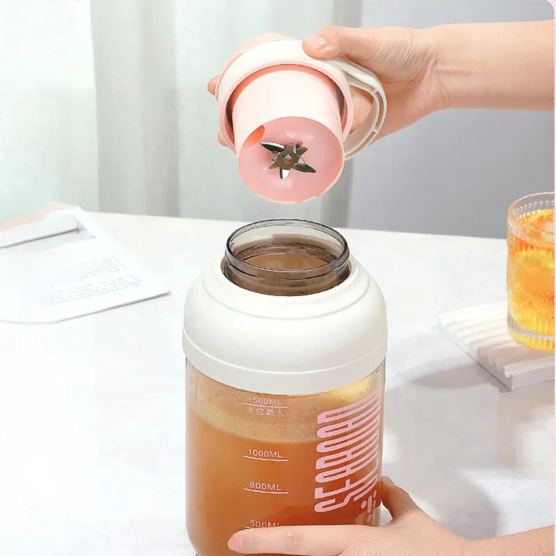 Electric portable juicer with 1500ml juice cup, 80W motor, plastic body, and PC food grade liner, shown in pink, grey, green, or orange.