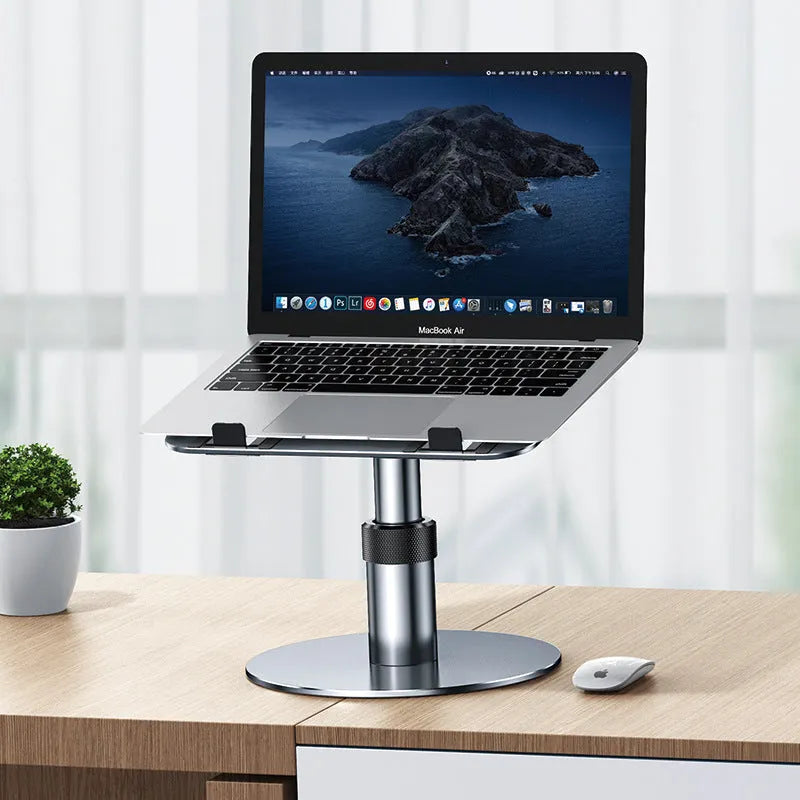 Silver adjustable aluminium car laptop stand extended on a car back seat.