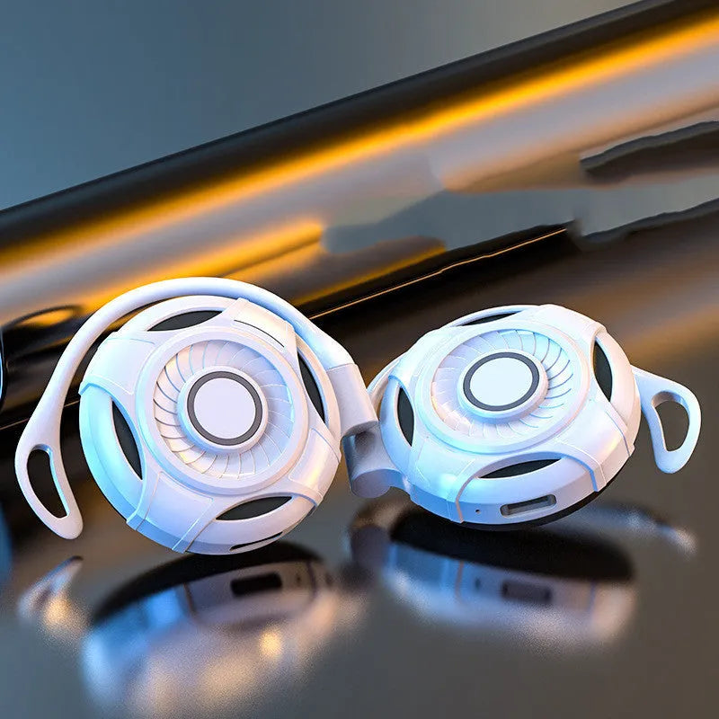 Black and white Bluetooth gaming earphones with hanging ear design showing wireless connectivity