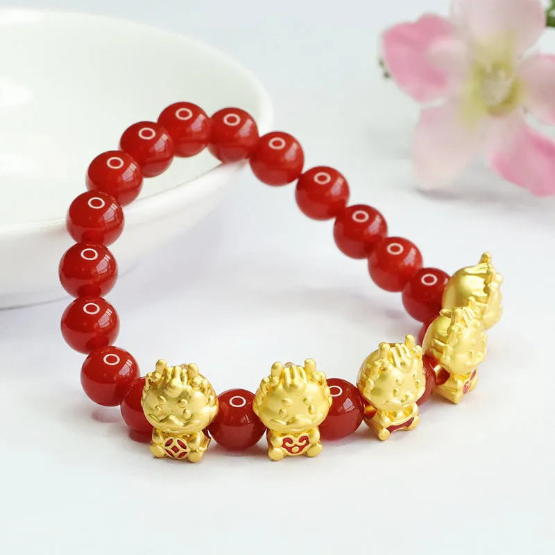 Red agate bracelet with Chinese dragon motif on 8mm beads.