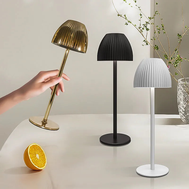 Small modern night lamp with dimming controls and thin round base in black or white colour options