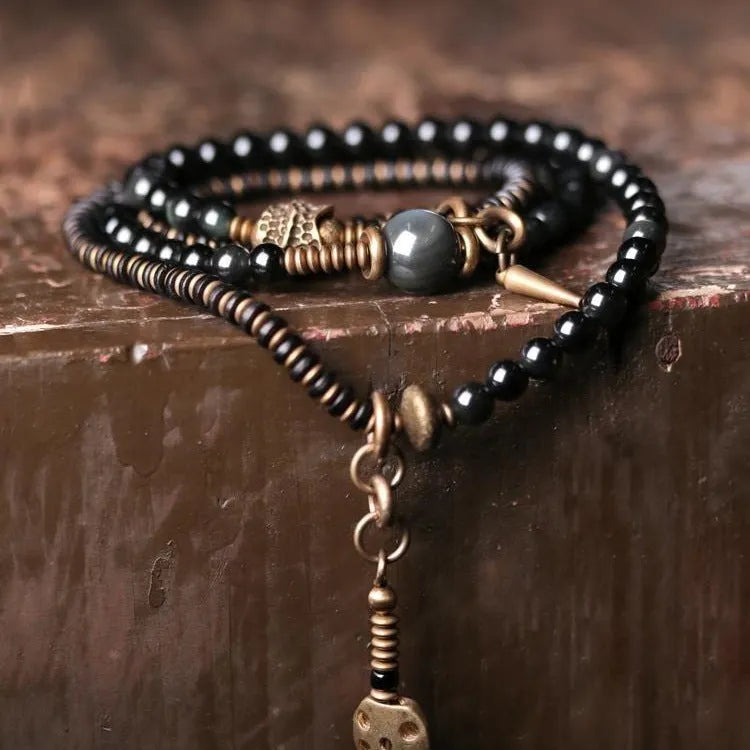 Black geometric beaded bracelet with layered design and natural style jewellery
