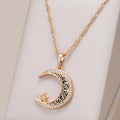 Rose gold necklace with zircon star moon pendant and enamel detailing on adjustable water wave chain