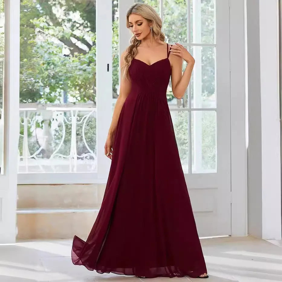 Sleeveless sling neckline banquet dress with long pleated A-line skirt in light green colour