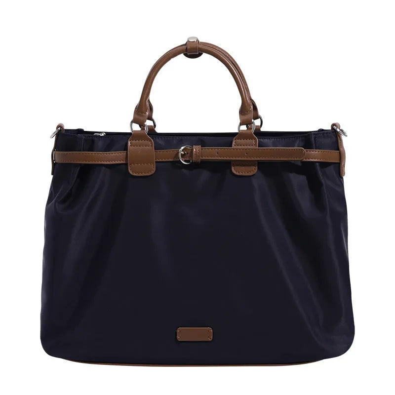 Women's nylon tote bag with organisation pockets in black colour showing internal compartments