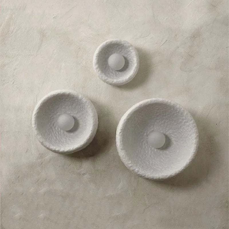 Japanese minimalist wall lamp with resin shade in three size options for ambient lighting